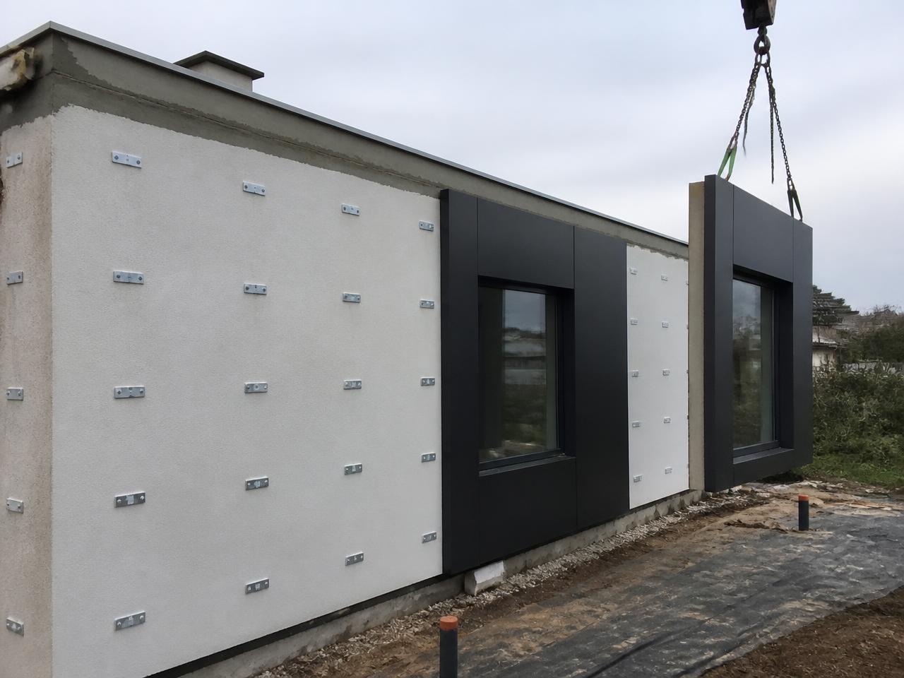 Einfamilienhaus nach energetischer Sanierung mit neuer Fassade
